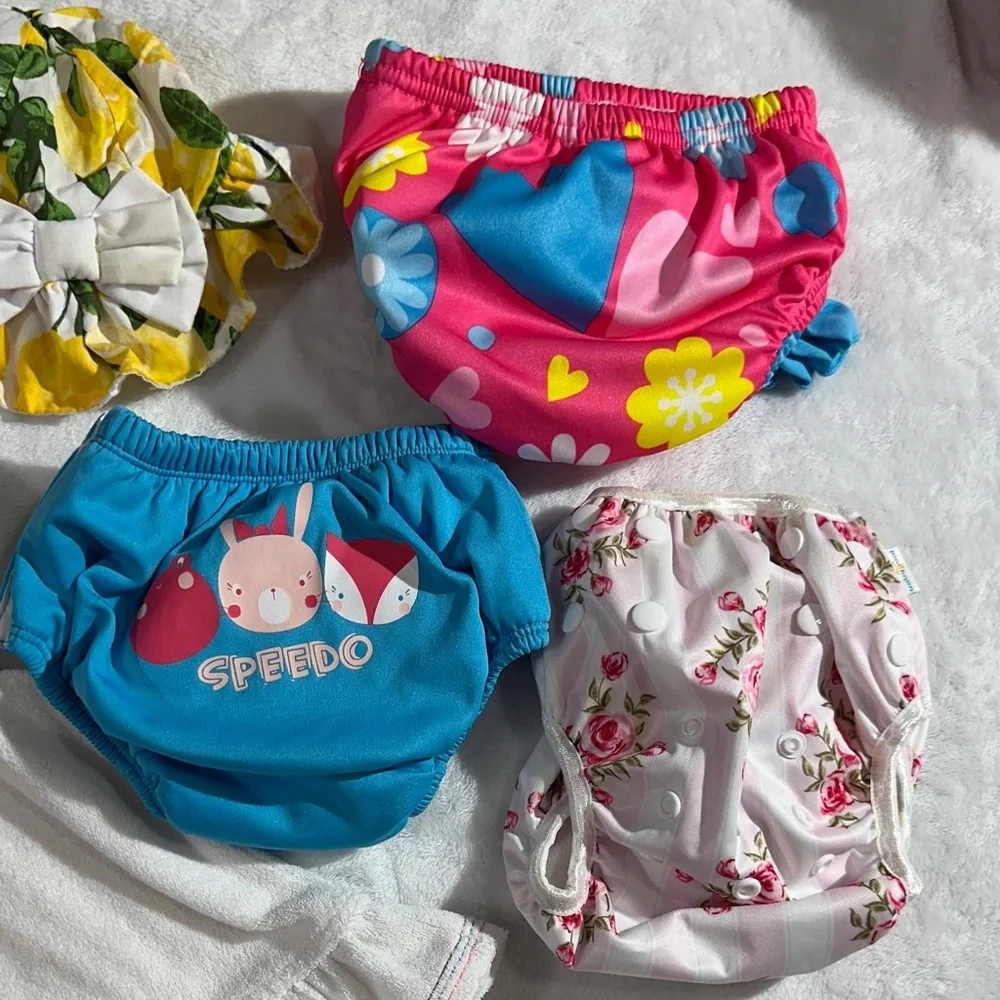 NWOT baby girls summer swim bundle. Coverup, 3 swim diapers, & hat 12/18mo